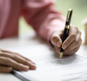 Signing of a real estate contract. Home Insurance and Real Estate